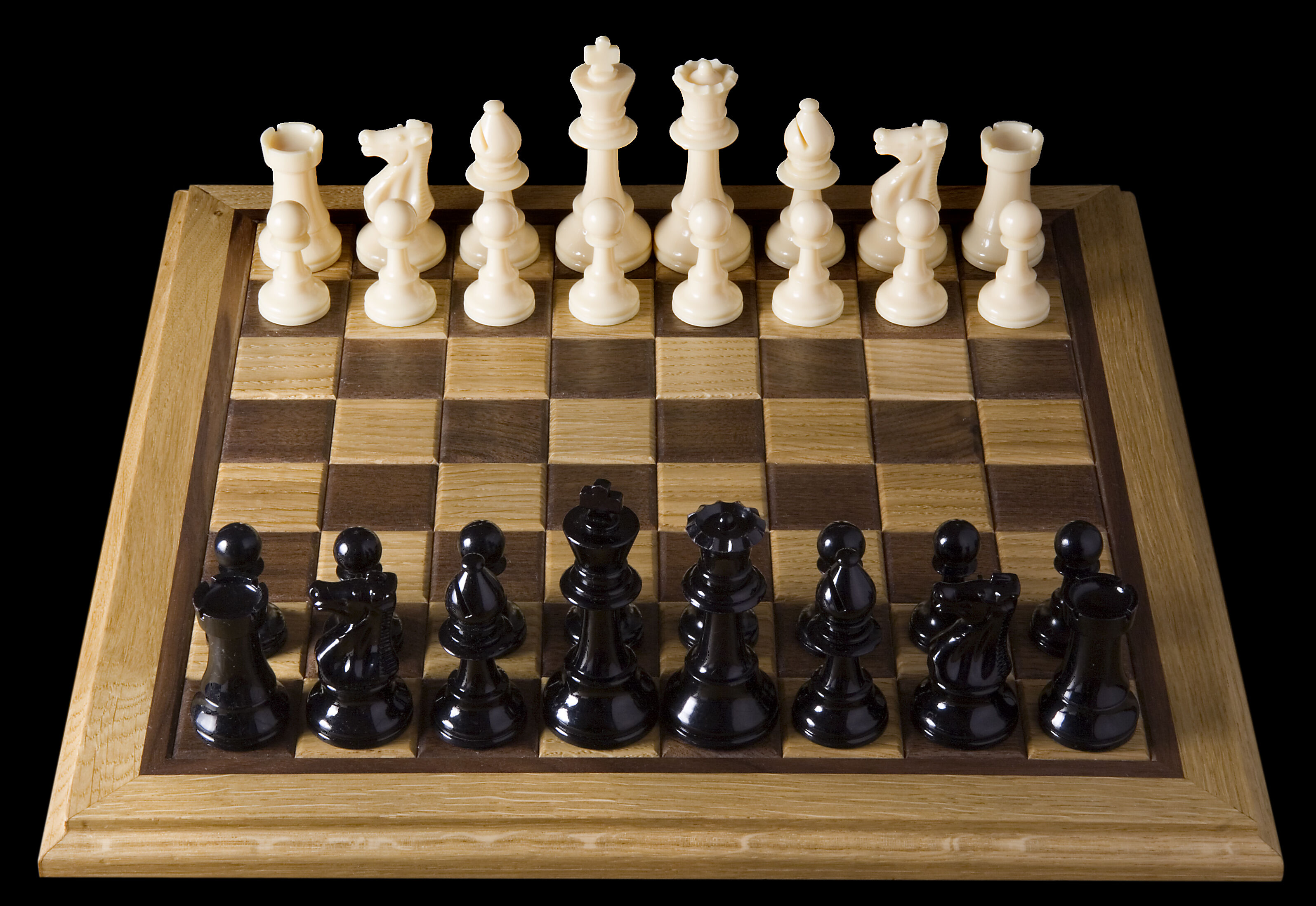 Wooden chess board with starting position