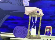 Yami Bakura erläutert Yami Yugi zwei seiner drei Sanduhr-Joker