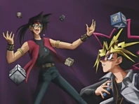 Duke se enfrenta a Yugi en su propio juego.