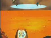 Jaden, Alexis y Velo Nocturno en plataforma de Duelo. Syrus y Chumley en esfera en un volcán activo.