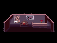 Madotsuki sitting on his sofa