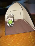 Paper cutout of Conrad in an empty tent. Uploaded to RAHU's Twitter 2015/09/18.
