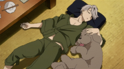 Victor sleeping next to Makkachin