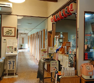 Chiaki uses the Health Tester seen at left in the lobby