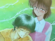Keiko cuidando a Yusuke.