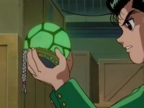 Yusuke holding the Orb of Baast and the Forlorn Hope
