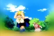 Zatch running away from Tia.