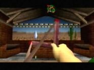 Stand de tir avec le lance-pierre dans Ocarina of Time