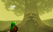 Link frente al Gran Árbol Deku en Ocarina of Time 3D.