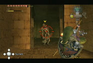 Link combatiendo con un ReDead en Twilight Princess.