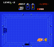 Link combattant Dodongo dans la salle du boss.