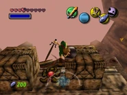 Triforce.jpg (42 kio) Bouton rouge permettant de renverser le temple grâce aux Flèches de Lumière