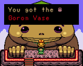 Link receiving the Goron Vase in Oracle of Seasons