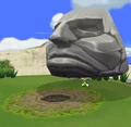 Link lifting a Stone Watcher from The Wind Waker