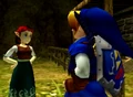 Link wearing the Zora tunic while talking to the Cucco Lady in Kakariko Village.