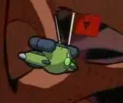 Nanoship following the Irken flags to Zim.