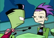 Zim waving his fist at Zita.