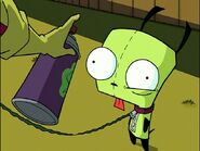 Zim sprays GIR in the face with antimicrobial spray, making GIR's eye twitch.