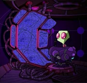 The command chair in front of the many monitors connected to it.