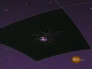 A closeup of a damaged panel of a planetary shell.