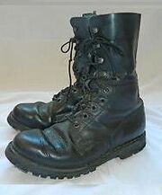 Military surplus boots, all leather, tough damn tough, possible nylon thread and dense out-sole.